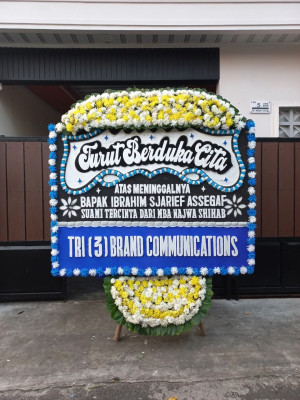 Papan Bunga Duka di Kumelembuay